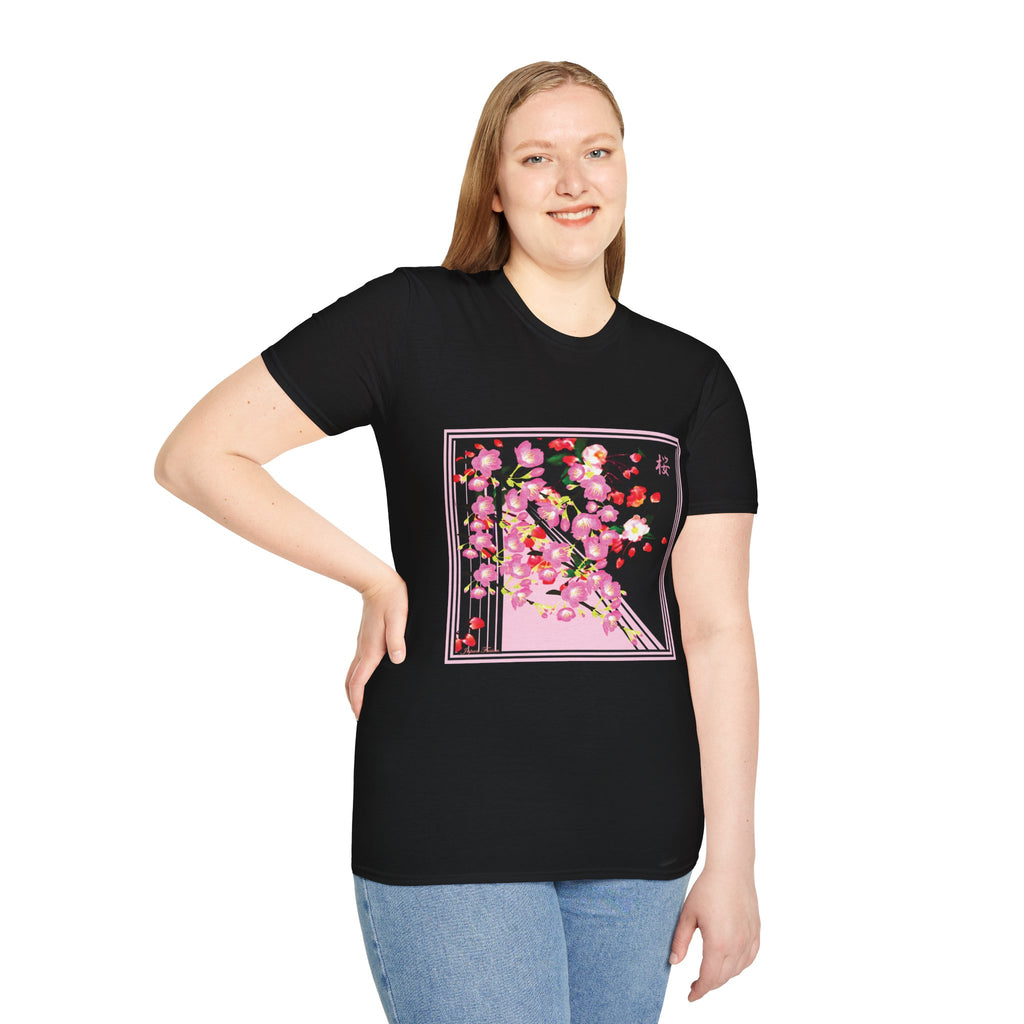 Female wearing a black t-shirt with a floral design on a white background