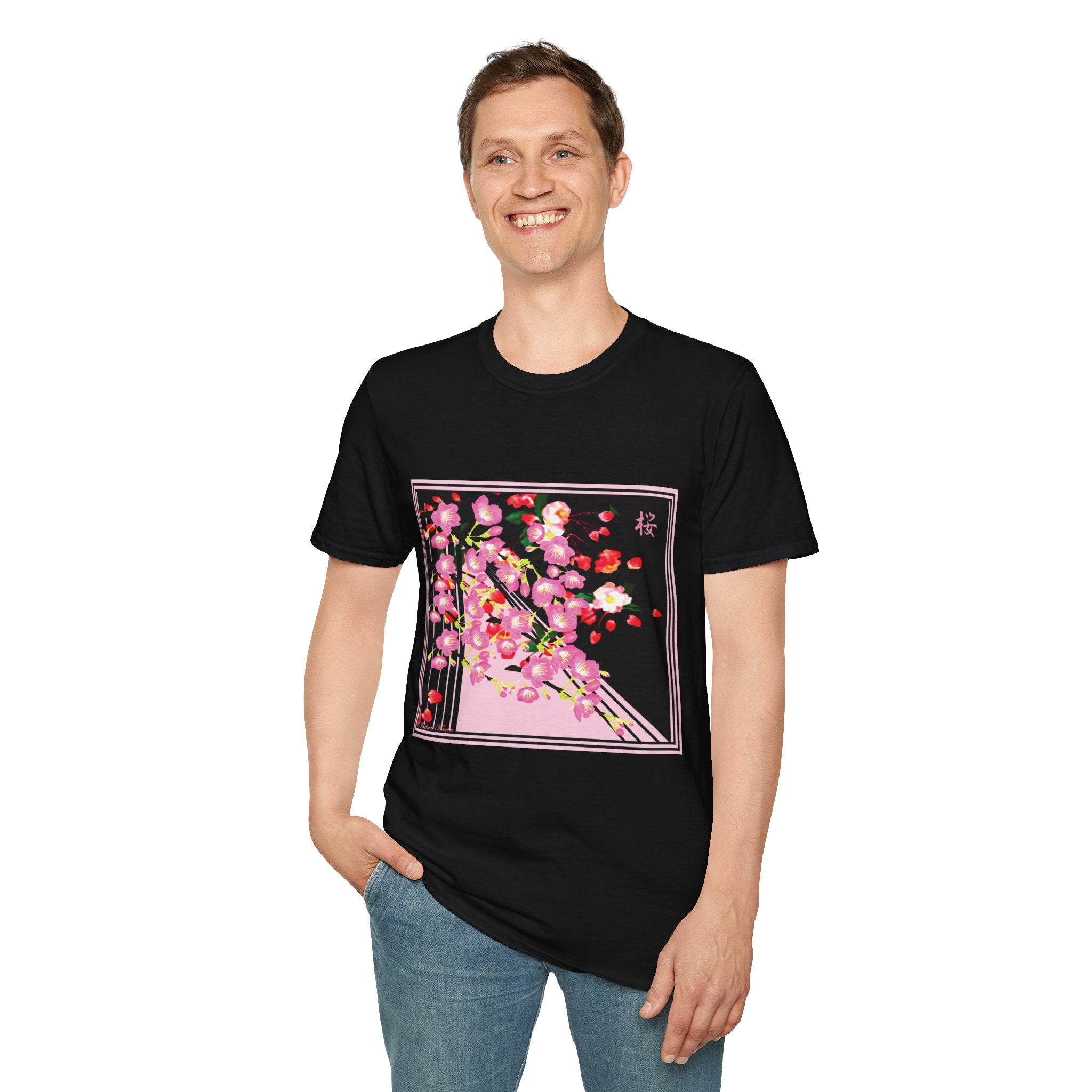 Male wearing a black t-shirt with a colorful graphic design on a white background