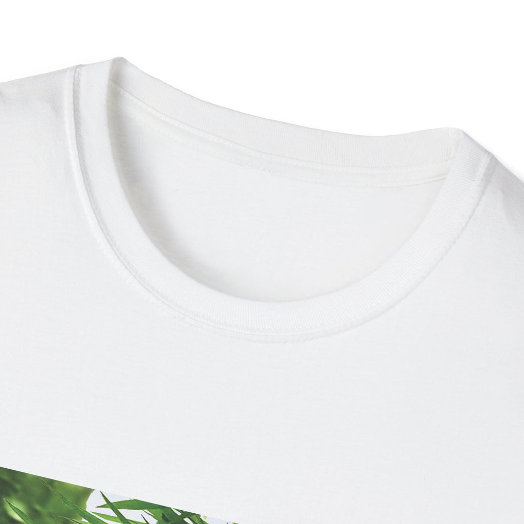 Close-up of a white t-shirt with a green leaf design on a white background