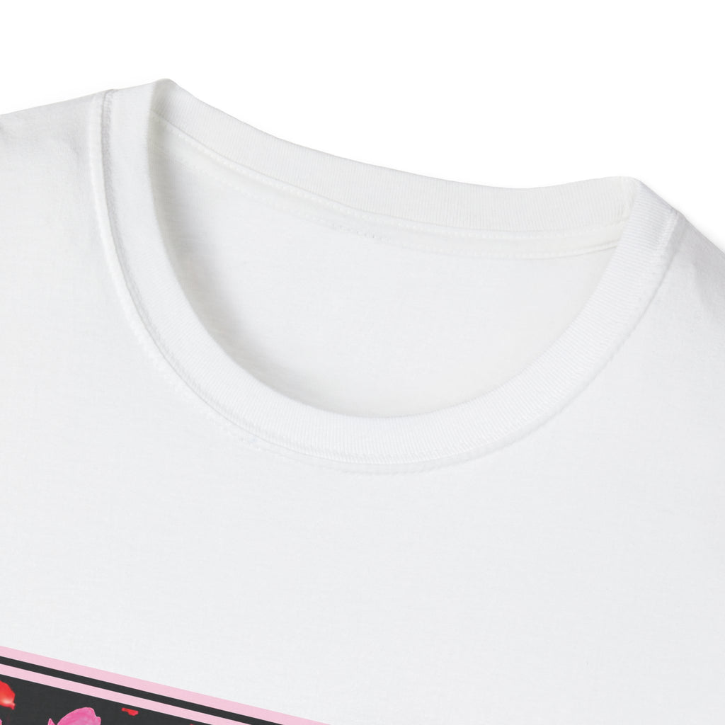 Close-up of a white t-shirt with a small pink and black design at the bottom.