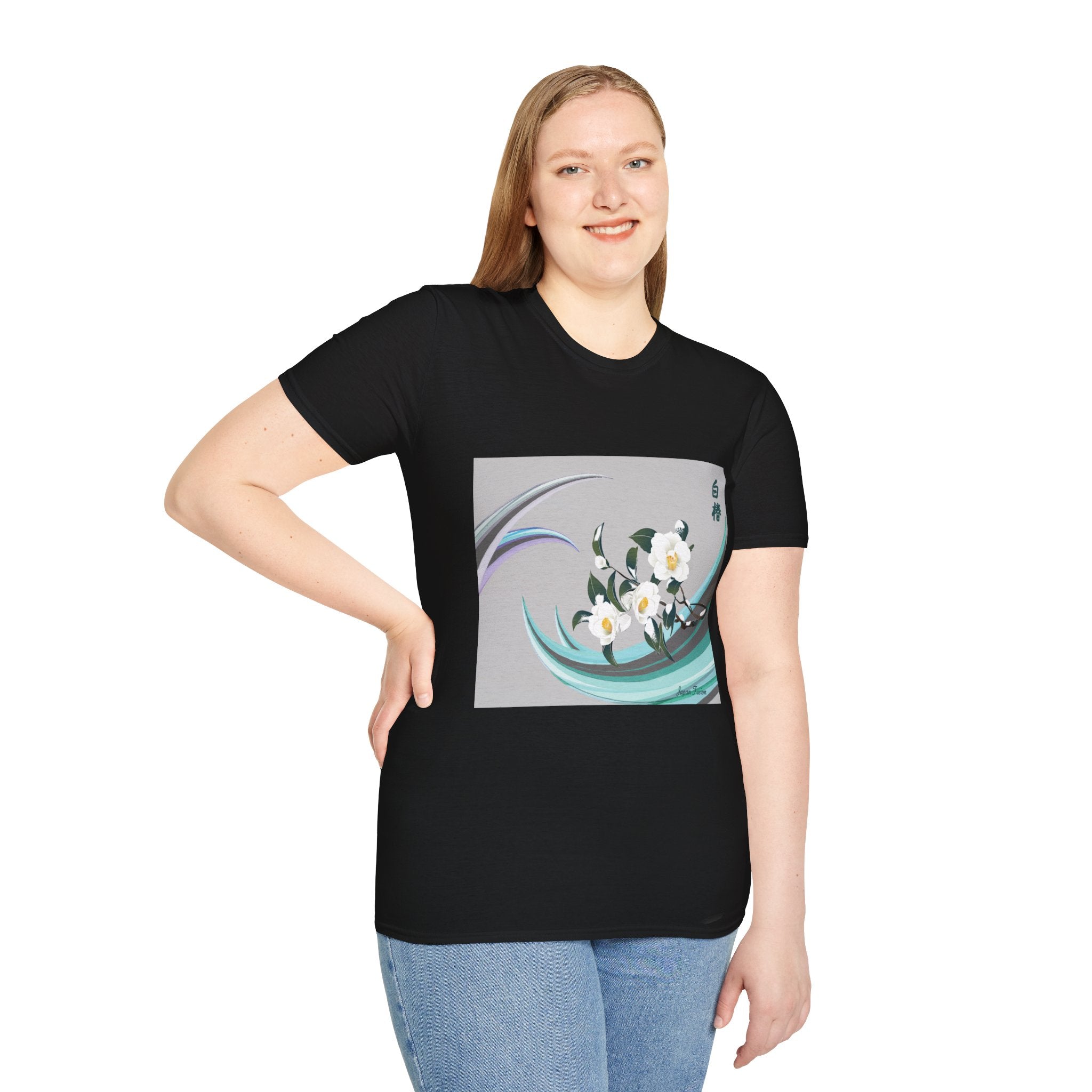Female wearing a black t-shirt with a floral design on a white background