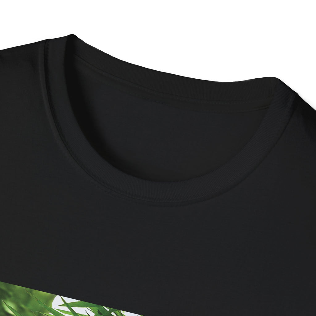 Close-up of a black shirt with green design on a white background