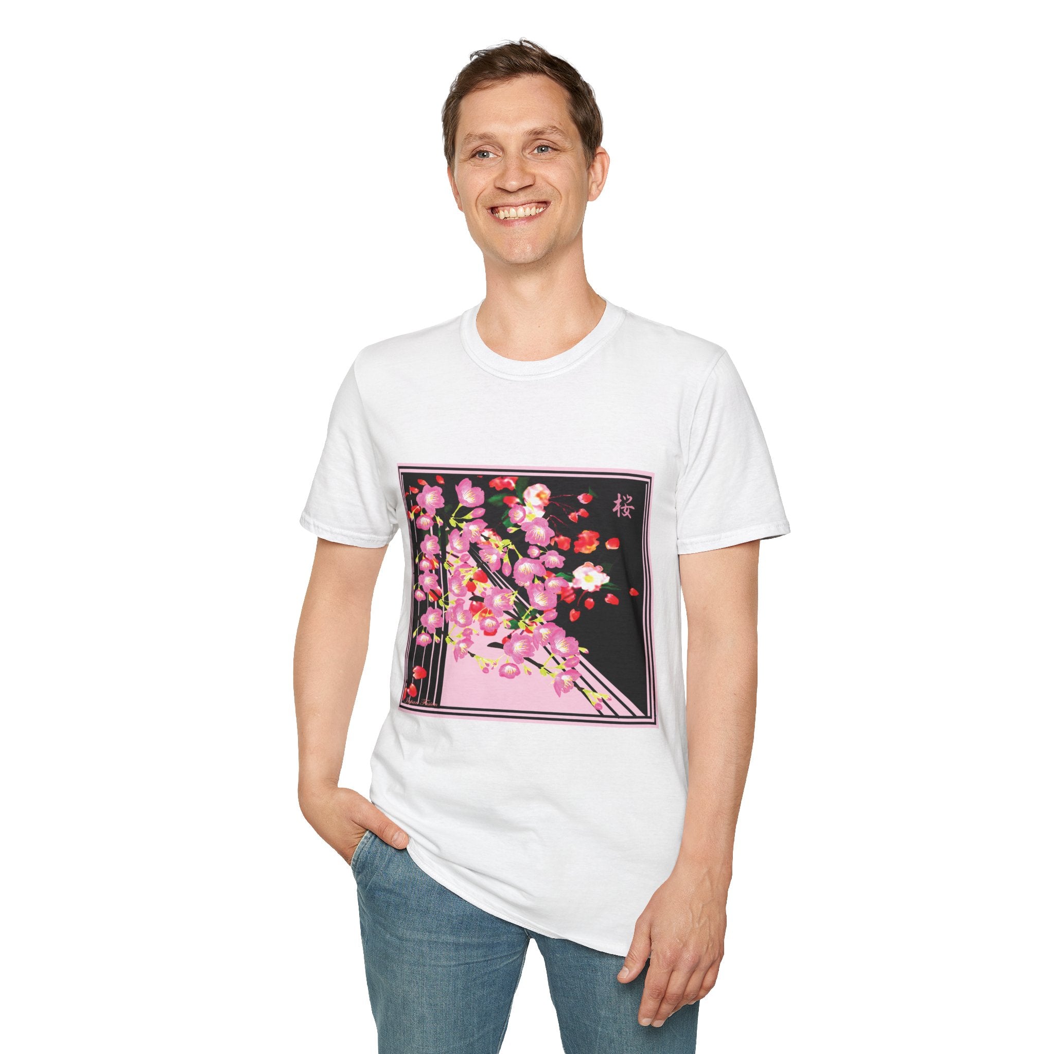 Male wearing a white t-shirt with a floral design on a plain background